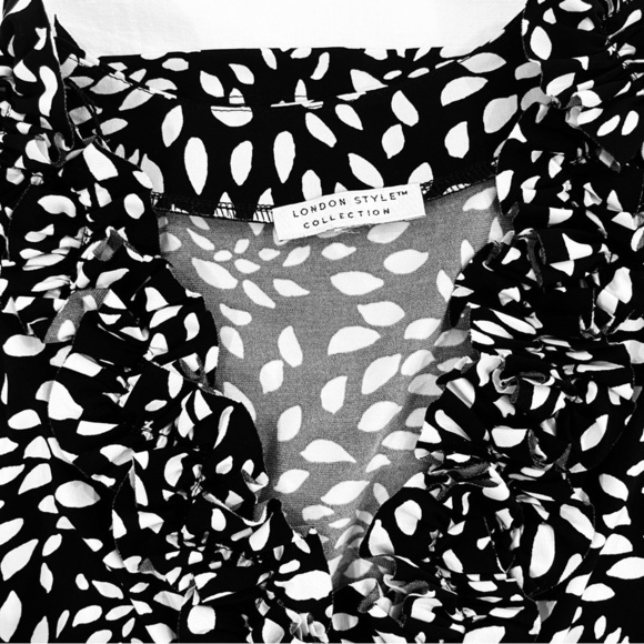 London Style Sleeveless Ruffle Dress | Black White V Neck Knee Length Polka Dot - Picture 4 of 9